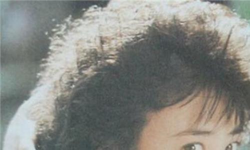 傅艺伟年轻时的照片流露 被网友称90年代女神