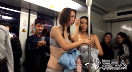 >上海地铁两名女子当众脱衣 广告营销?(图)