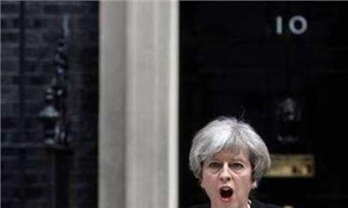 英国首相特雷莎梅含泪哽咽宣布6月7日辞职