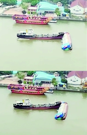 广州两货船相撞 一船侧翻致4人落水