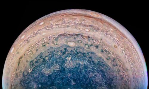木星南极美图公布 蓝色漩涡令人震撼