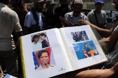 卡扎菲儿女的现状 卡扎菲女保镖死的图片 利比亚卡扎菲女儿照片