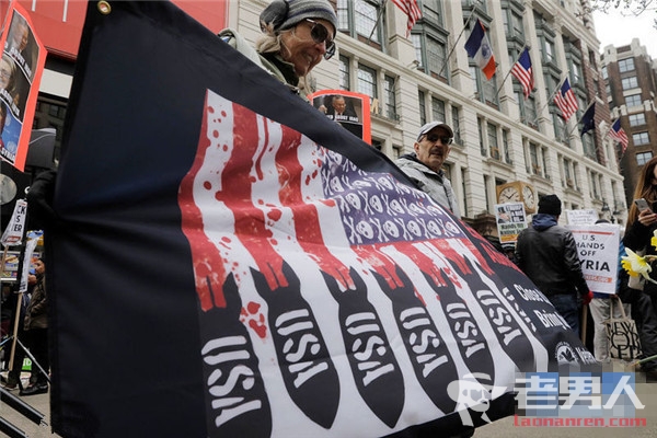 >美国民众反战游行 呼吁美英法联军停止袭击叙利亚
