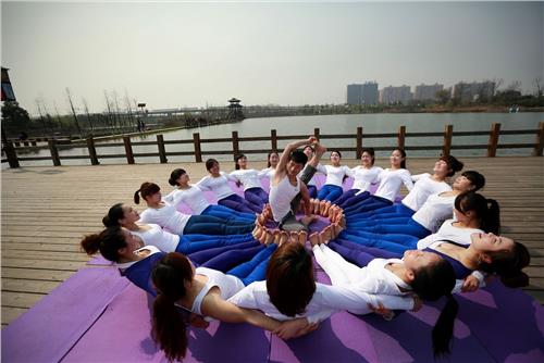 >长沙最专业口碑最好的反重力空中瑜伽教练培训优嘉瑜伽